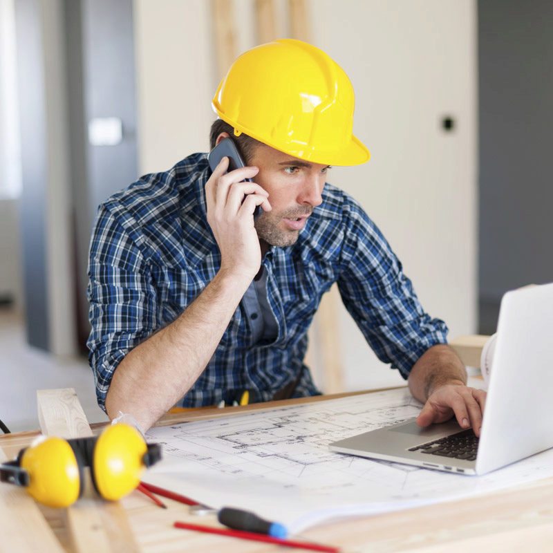 Contractor on the computer