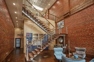 thick tread floating staircase in powder coat silver