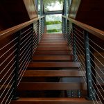 View From Bottom of Floating Stairs with Cable Railing