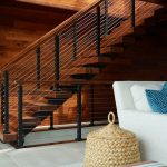 Interior Floating Stairs By Matching Wood Paneling