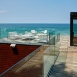 Glass Railing on Balcony Along Coast